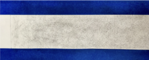 Photograph of a vertical striped pattern framed by blue painter's tape demonstrating a toned step scale.
