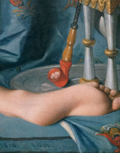 Hookah (detail), Jean-Auguste-Dominique Ingres, La Grande Odalisque, showing the figure's foot overlapped in front of a hookah. The detail scene is set in front of a patterned blue cloth.