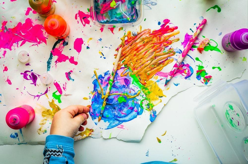 Creative Commons Attribution-Share Alike 3.0 White paper with vibrant paint splashed around