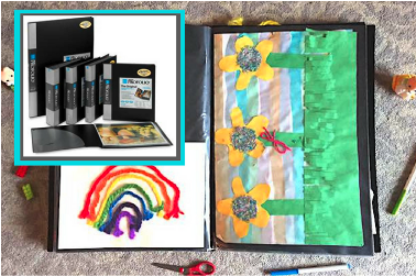 Open scrapbook with a rainbow on the left page and sunflower painting on the right. Surrounding by art supplies