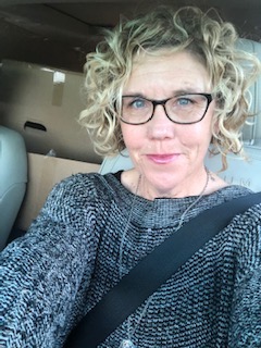 white woman smiling