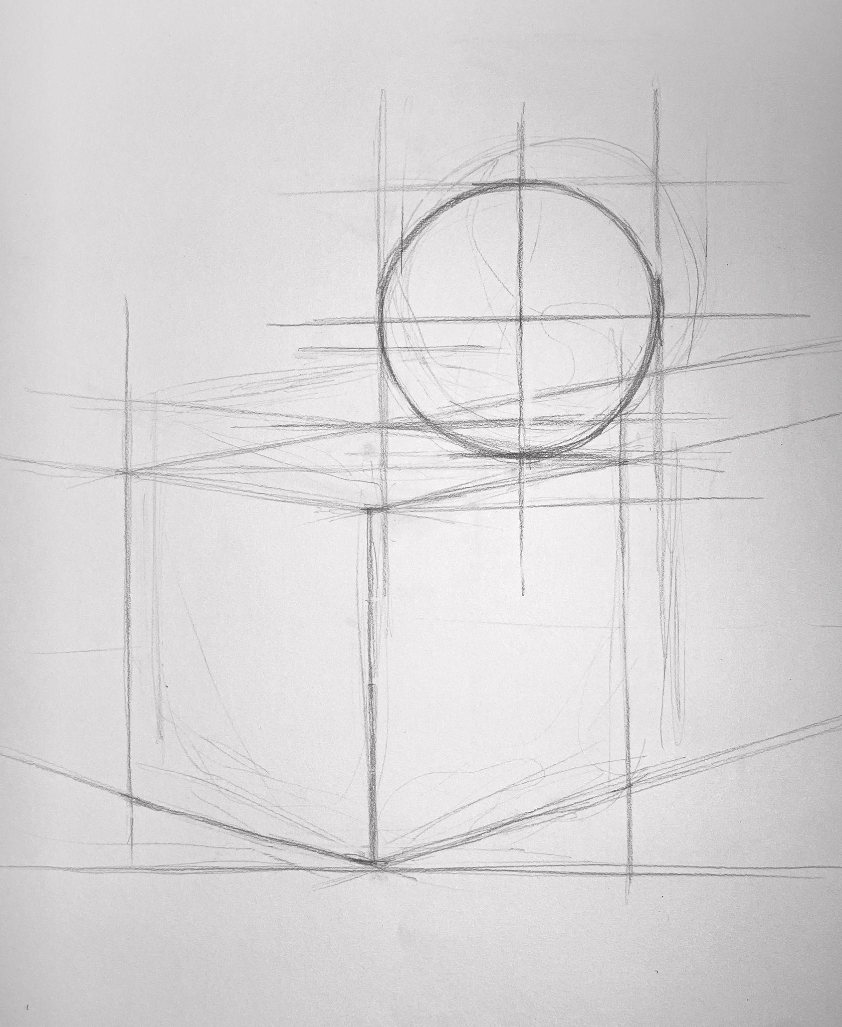 A pencil sketch showing geometric construction lines forming a cube with a circle intersecting the top face. The drawing highlights perspective and alignment techniques using straight and curved lines to establish spatial relationships.