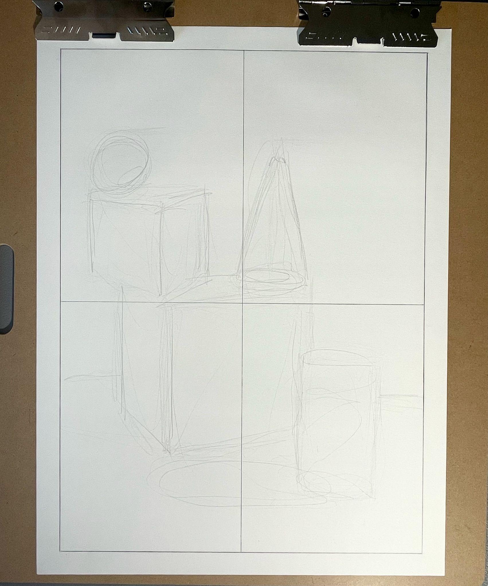 A photograph of a pencil sketch on white paper clipped to a drawing board shows basic geometric shapes including a circle, cone, cube, and cylinder. The sketch is divided into four quadrants by faint vertical and horizontal lines, serving as a guide for proportion and placement.