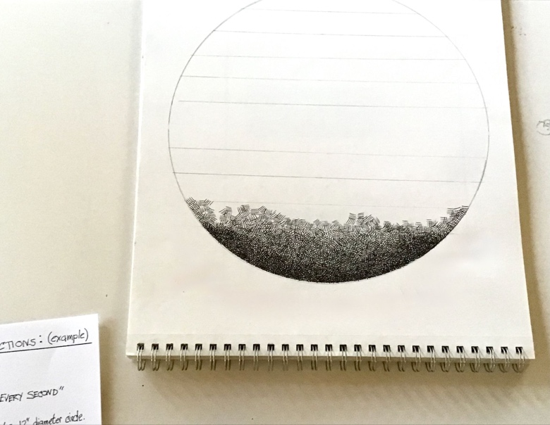 Photograph of a sketchbook page featuring a large circle with horizontal lines and dense stippling concentrated at the bottom half. The stippling creates a textured gradient effect transitioning from dark at the base to lighter as it moves upward within the circle.