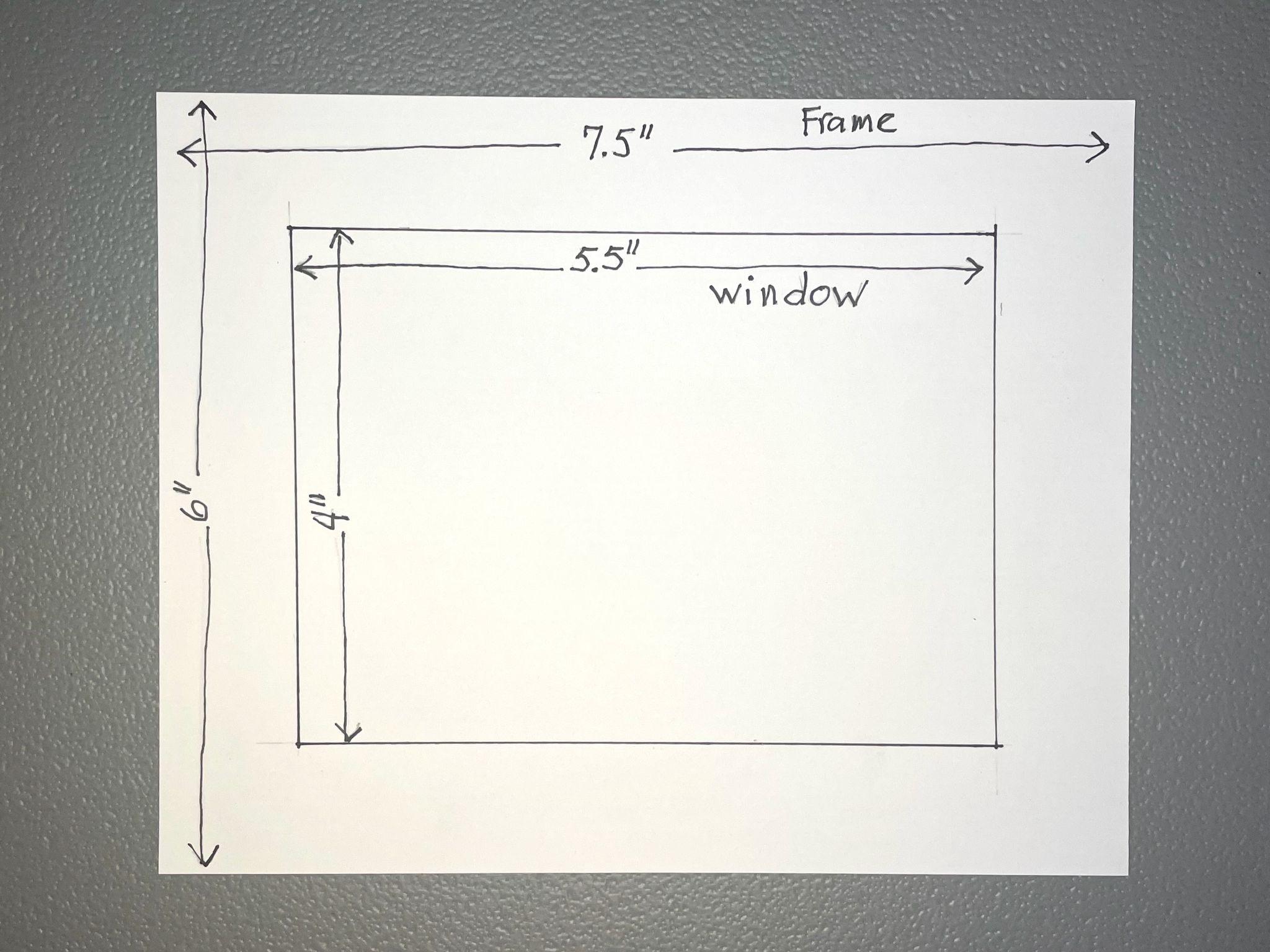 Hand-drawn diagram showing dimensions of a rectangular viewfinder frame and window, with frame measuring 7.5 inches by 6 inches and window measuring 5.5 inches by 4 inches. Labels and arrows indicate width and height for both frame and window on a white sheet against a gray background.