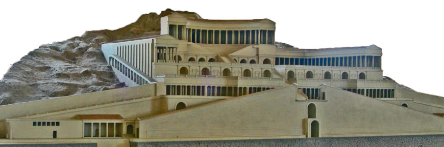 A detailed architectural Model of the Sanctuary of Fortuna Primigenia terraced structure built into a hillside, featuring multiple levels with columns, arches, and stairways. The model highlights the layout and design elements of a large, complex building, emphasizing its tiered construction and classical architectural features.