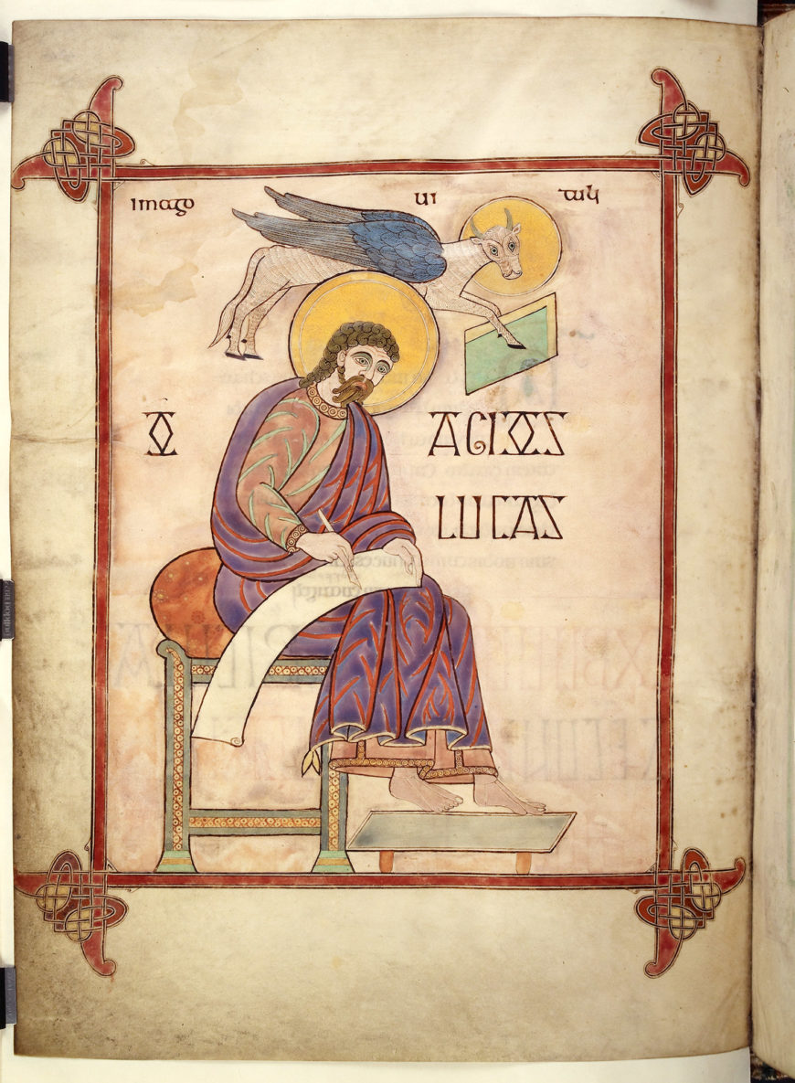 Illuminated manuscript page depicting Saint Luke seated on a chair, writing on a scroll with a winged ox above him, symbolizing his gospel. The artwork features a decorative red border with intricate knot designs in corners and Latin text identifying Saint Luke.