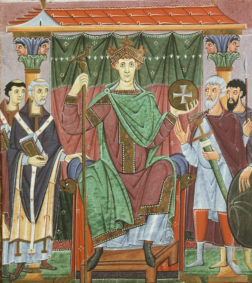 Medieval-style painting depicting a crowned king seated on a throne, holding a scepter and an orb with a cross, surrounded by attendants in robes. The scene features rich colors like green, red, and gold, with architectural elements such as columns and a canopy, highlighting royal authority and religious symbolism.