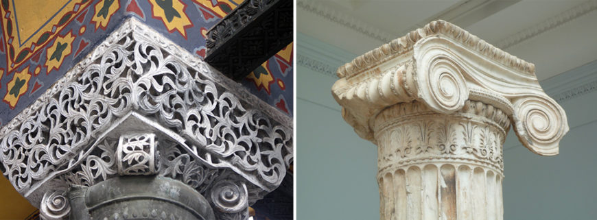 Photograph showing two architectural column capitals side by side for comparison. Left capital features intricate, swirling floral patterns in white stone with colorful geometric tile background, while right capital displays a classical Ionic design with volutes and fluted shaft in aged white marble.