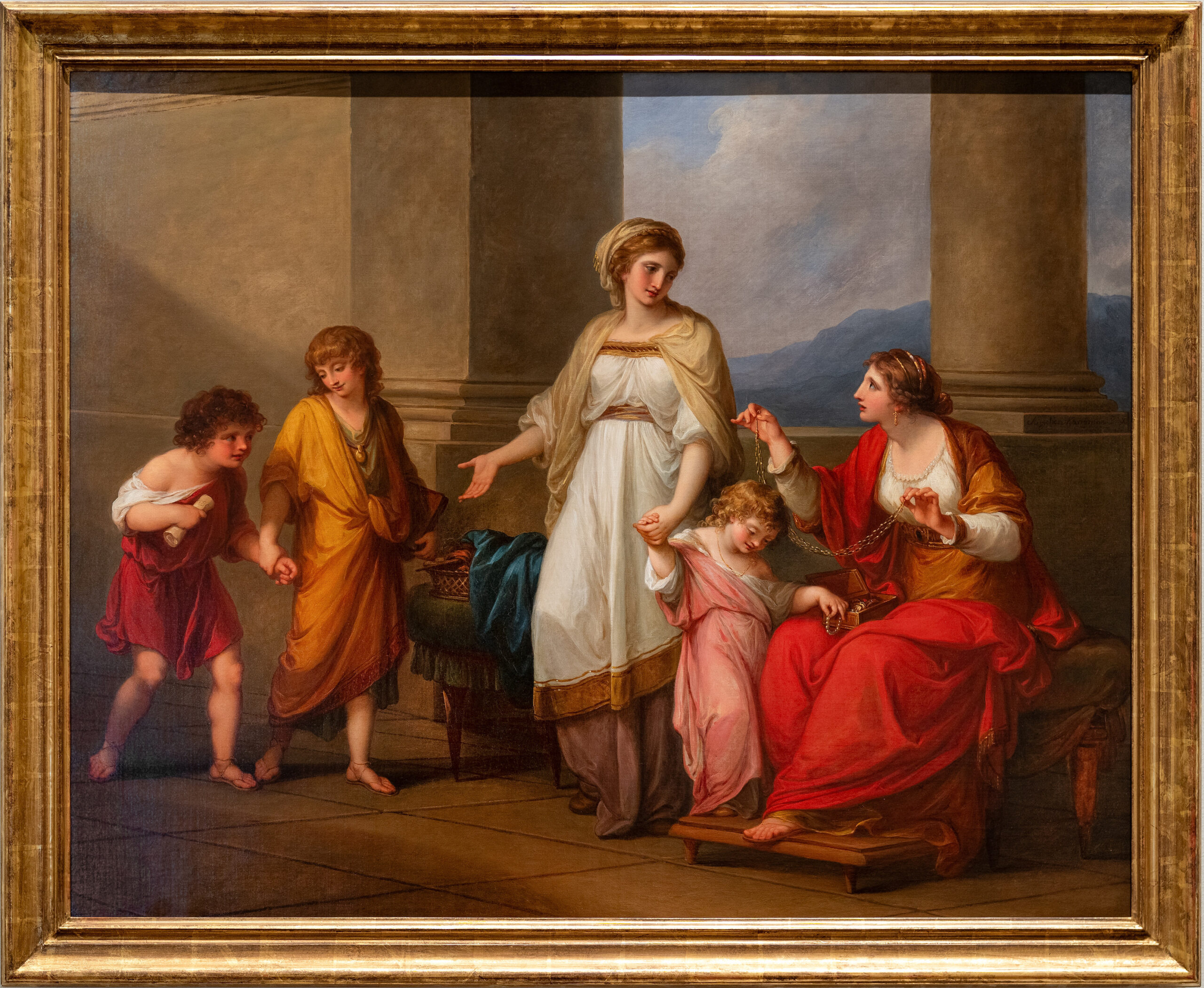 Angelica Kauffmann, Cornelia, Mother of the Gracchi, Pointing to her Children as Her Treasures, painting depicting five figures in ancient attire within a grand architectural setting featuring large columns and a distant landscape. Central figures include a woman in white and gold robes gesturing toward children and a seated woman in red holding jewelry.