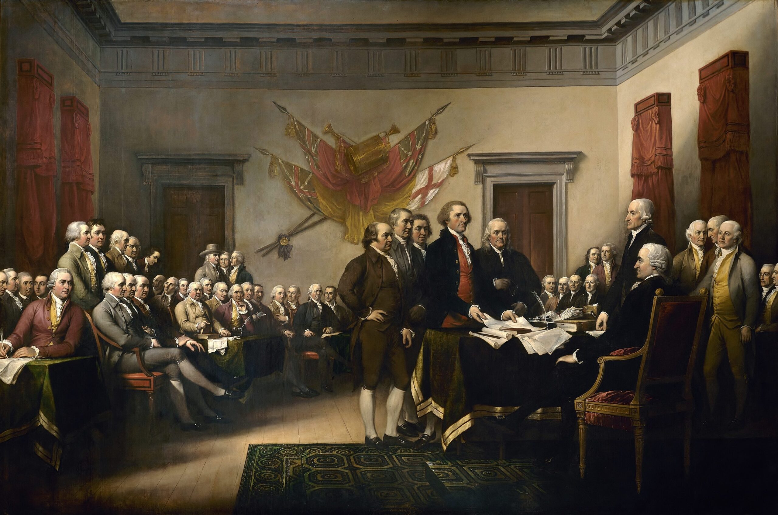 John Trumbull, Declaration of Independence, painting depicting the presentation of the Declaration of Independence to the Continental Congress. The scene features key historical figures in 18th-century attire gathered in a formal room with flags and documents, highlighting a pivotal moment in American history.