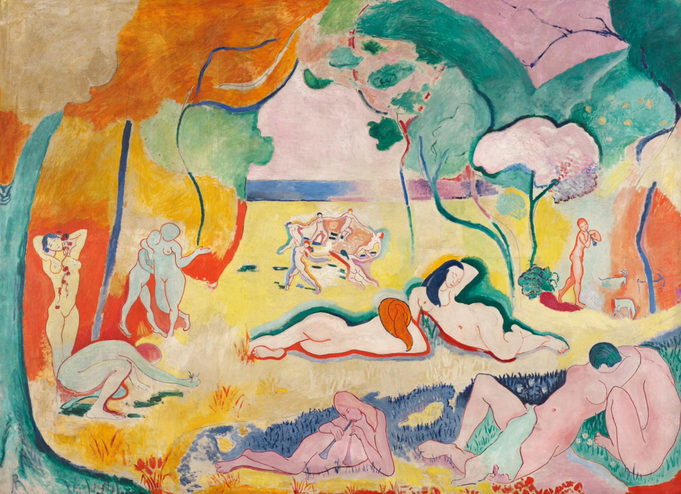 Outdoor landscape scene featuring several groupings of nude human figures, some dancing, some relaxing on the ground. The work uses bold colors of orange, yellow, green, and blue applied non-naturalistically to the canvas surface.