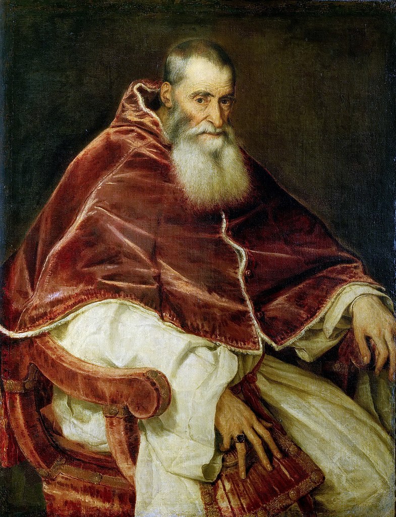 Titian, Portrait of Pope Paul III painting depicts a seated man wearing a rich red velvet robe with white sleeves, highlighting textures and folds of fabric. The composition emphasizes the subject's dignified posture and detailed hands, suggesting his religious significance.