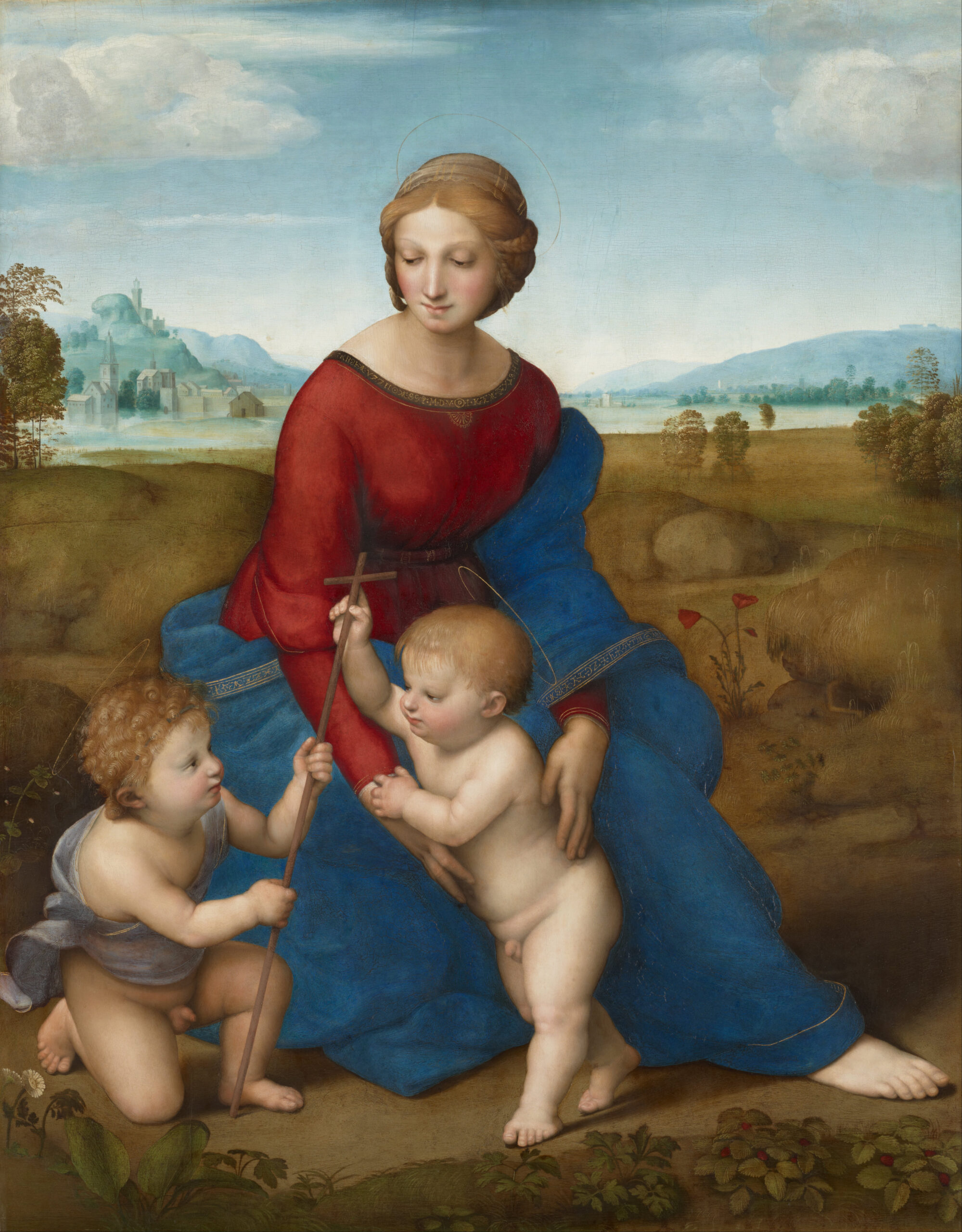 Raphael, Madonna of the Meadow painting depicting a seated woman in a red and blue dress with two young children, one holding a cross-shaped staff. The background features a serene landscape with distant mountains, trees, and a building with domes under a partly cloudy sky.