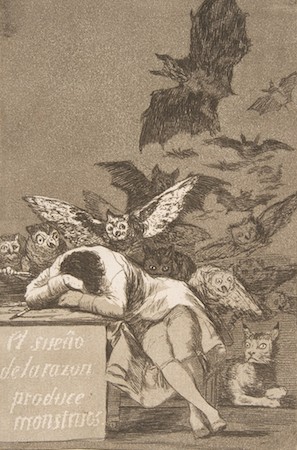 A monochromatic etching depicting a person asleep at a table surrounded by various nightmarish creatures, including bats, owls, and cats, symbolizing irrational fears. Text on the table reads "El sueño de la razón produce monstruos," highlighting the theme that the sleep of reason produces monsters.