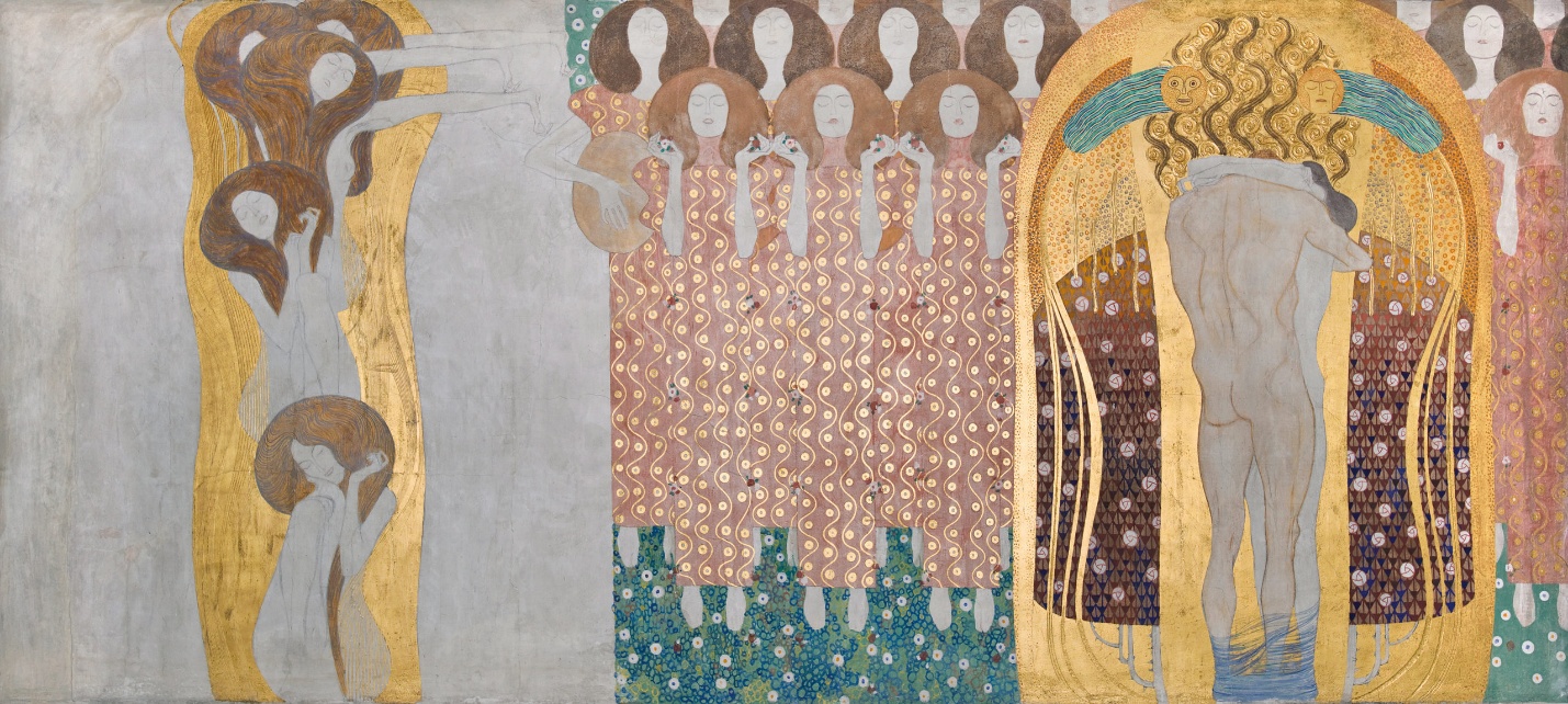 Gustav Klimt, Choir of Angels from the Beethoven Frieze, featuring a three part scene with nude female figures on the far right with curved bodies and rounded brown hair with the central panel of seven angelic figures. On the fright, a nude couple embraces in front of a gold and patterned background.