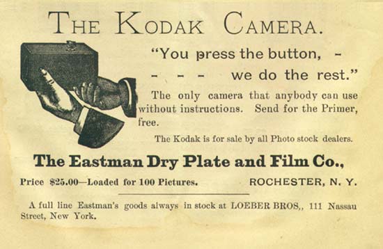 Vintage advertisement for Kodak Camera promoting ease of use with slogan "You press the button, we do the rest." Features illustration of hand holding camera, pricing details, and company information from Eastman Dry Plate and Film Co. in Rochester, NY.