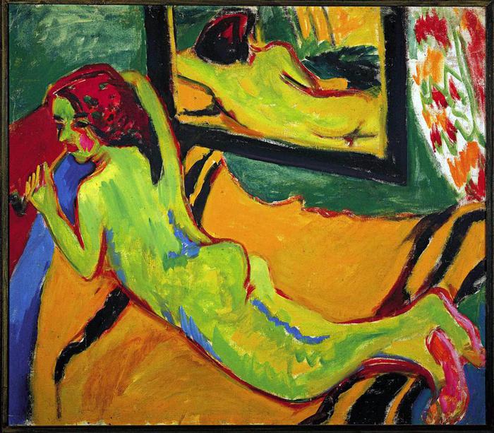 Ernst Ludwig Kirchner, Reclining Nude in Front of Mirror, painted in bright harsh tones of green, orange, red, and blue. The figure lies on her stomach while her reflection shows from a different perspective.